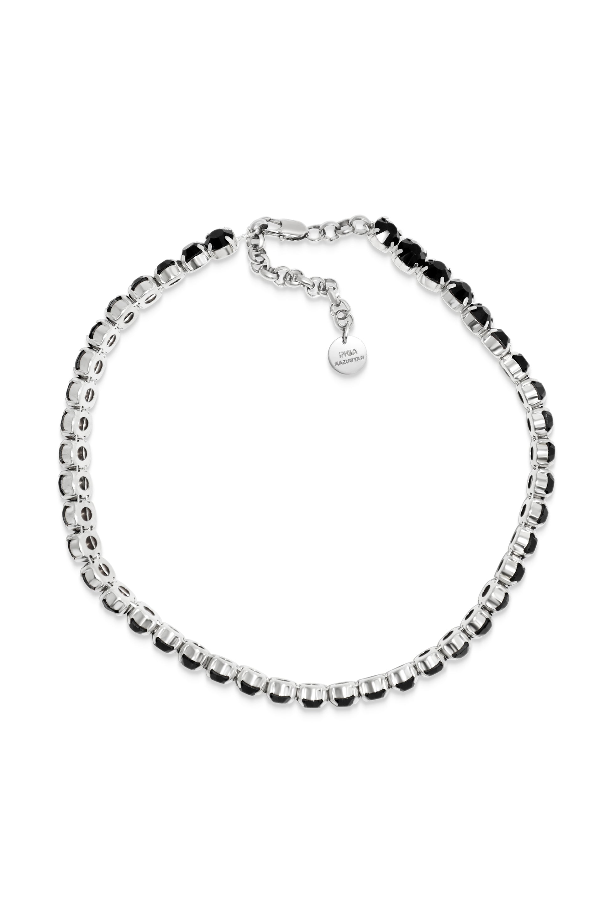 INGA KAZUMYAN'S choker necklace is strung with black Swarovski crystals