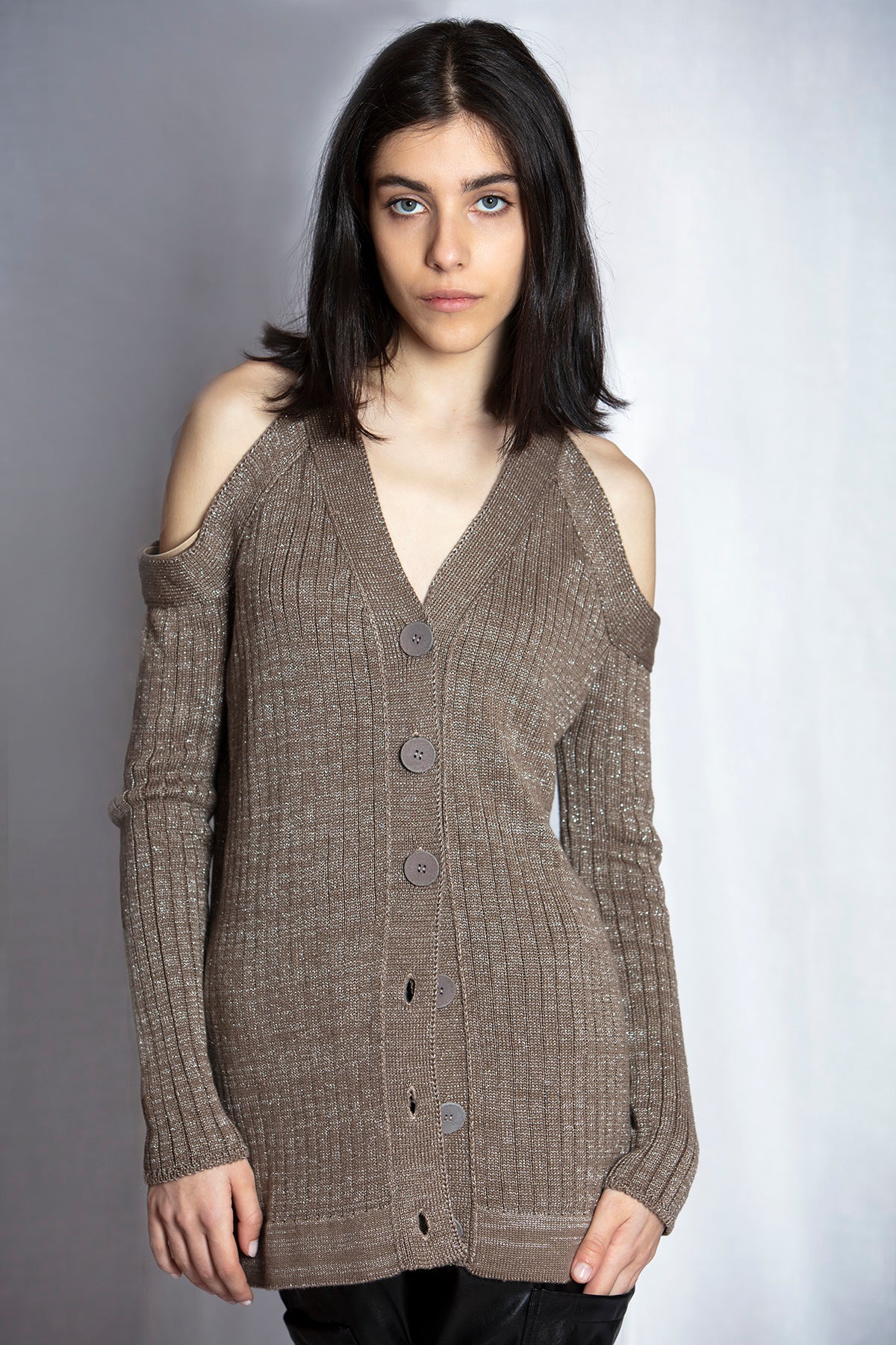 Cardigan from LOOM Weaving features cold-shoulder cutouts with lurex shine effect.