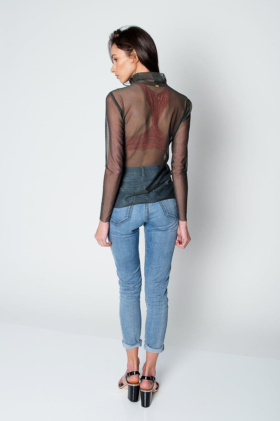 Tulle Turtleneck Top on a model