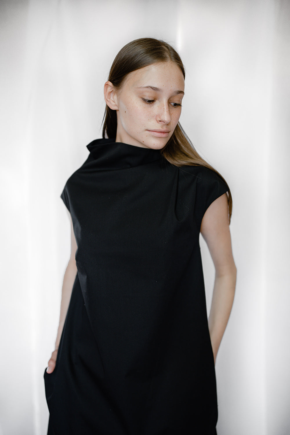 black asymmetric dress close view