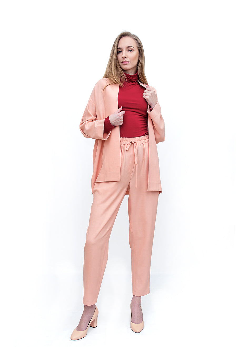 Model Wearing f by Faina Salmon Track Pants