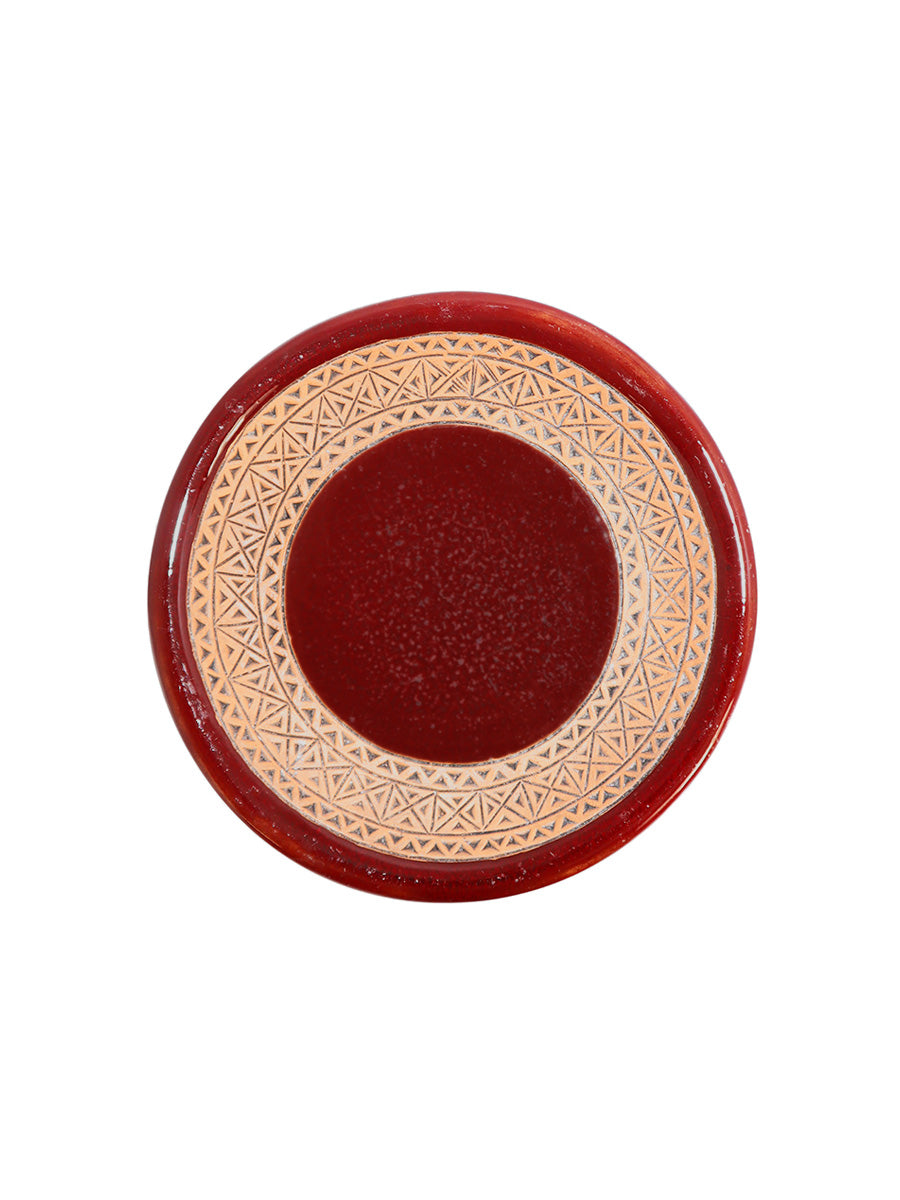 red ceramic plate