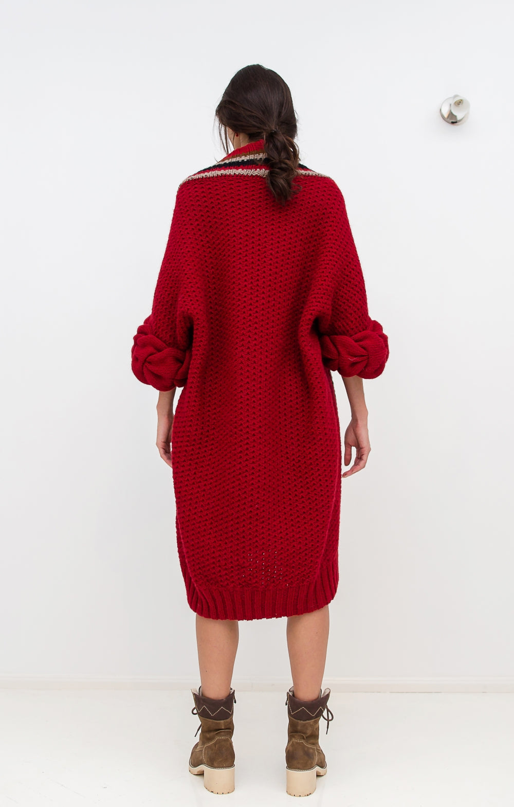 Knitted red cardigan back view